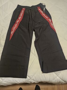 Civil Regime Black Joggers with Red Script Side Panels by